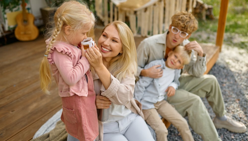 Happy family spending time together in their new home, TrekMovers