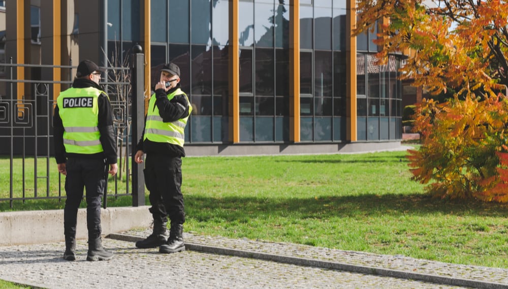 Police vehicle parked on a quiet residential street in Irvine, CA, TrekMovers