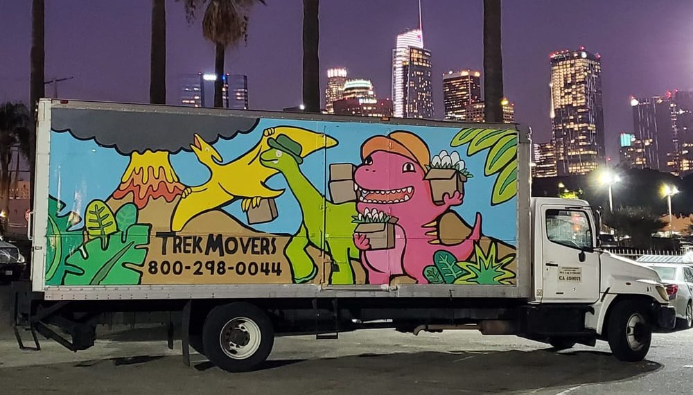 Moving truck driving from Los Angeles to San Diego along the highway, TrekMovers