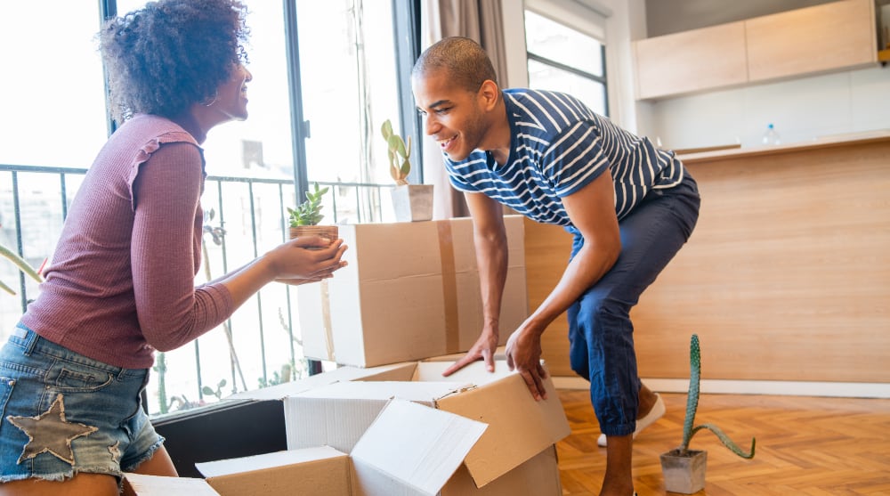 How to Pack for a Move — A Complete Guide couple packing cardboard box to move in new apartm 2021 08 29 21 52 28 utc