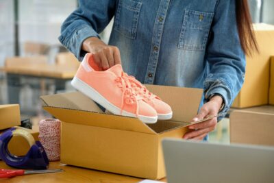 How to Pack Shoes for Moving online sellers are packing shoes in boxes to deliv 2023 11 27 05 29 35 utc