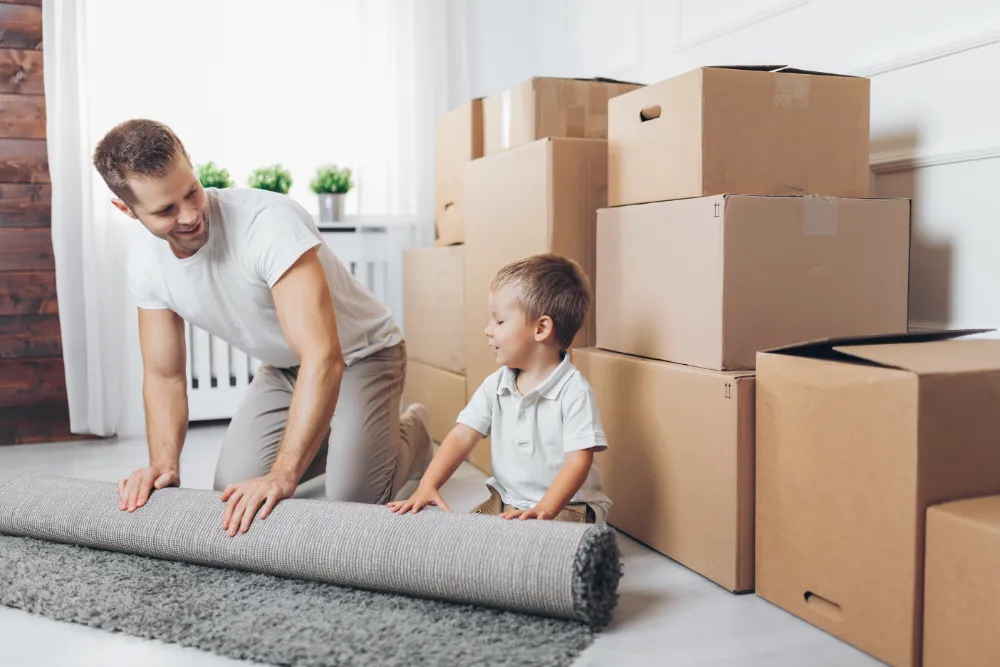 Moving in the winter: Your essential guide moving concept father and son moving to a new hom 2024 09 18 15 39 37 utc