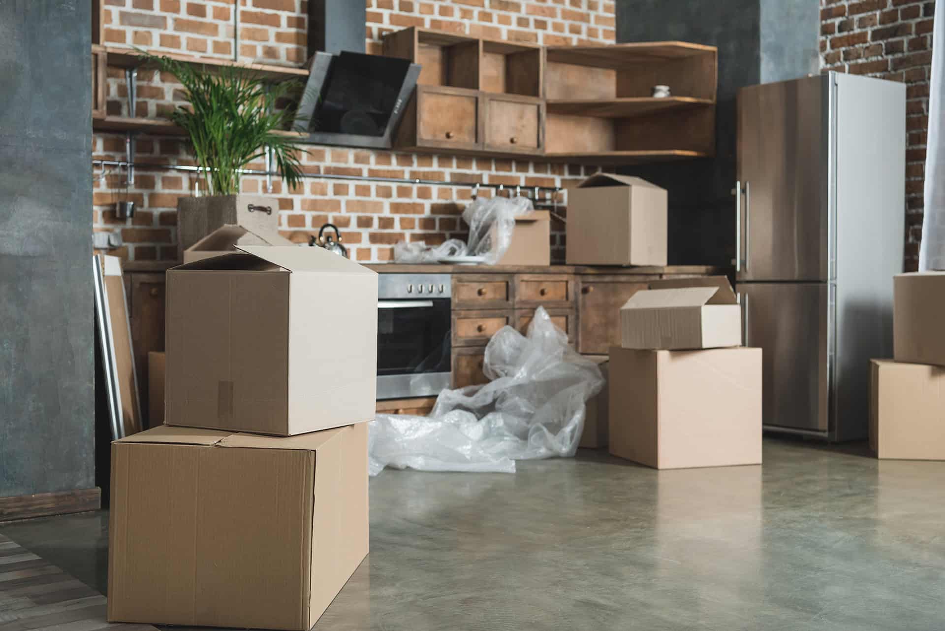 How to pack a kitchen for moving  cardboard boxes in empty kitchen during relocation 2024 11 19 09 02 06 utc 1