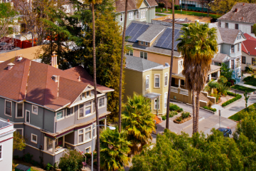 A high angle view of a row of Victorian style houses in a San Jose, CA neighborhood.