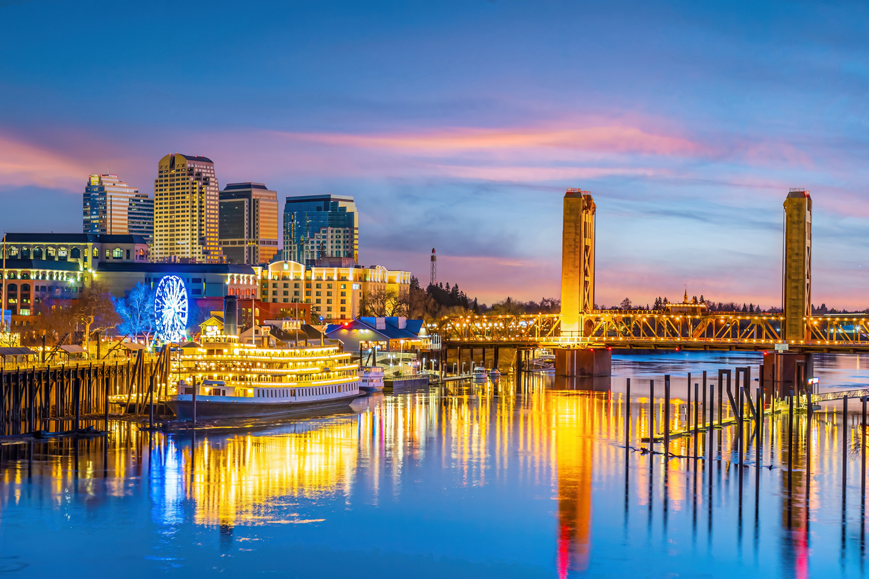 Old town Sacramento city skyline with Tower Bridge in California.