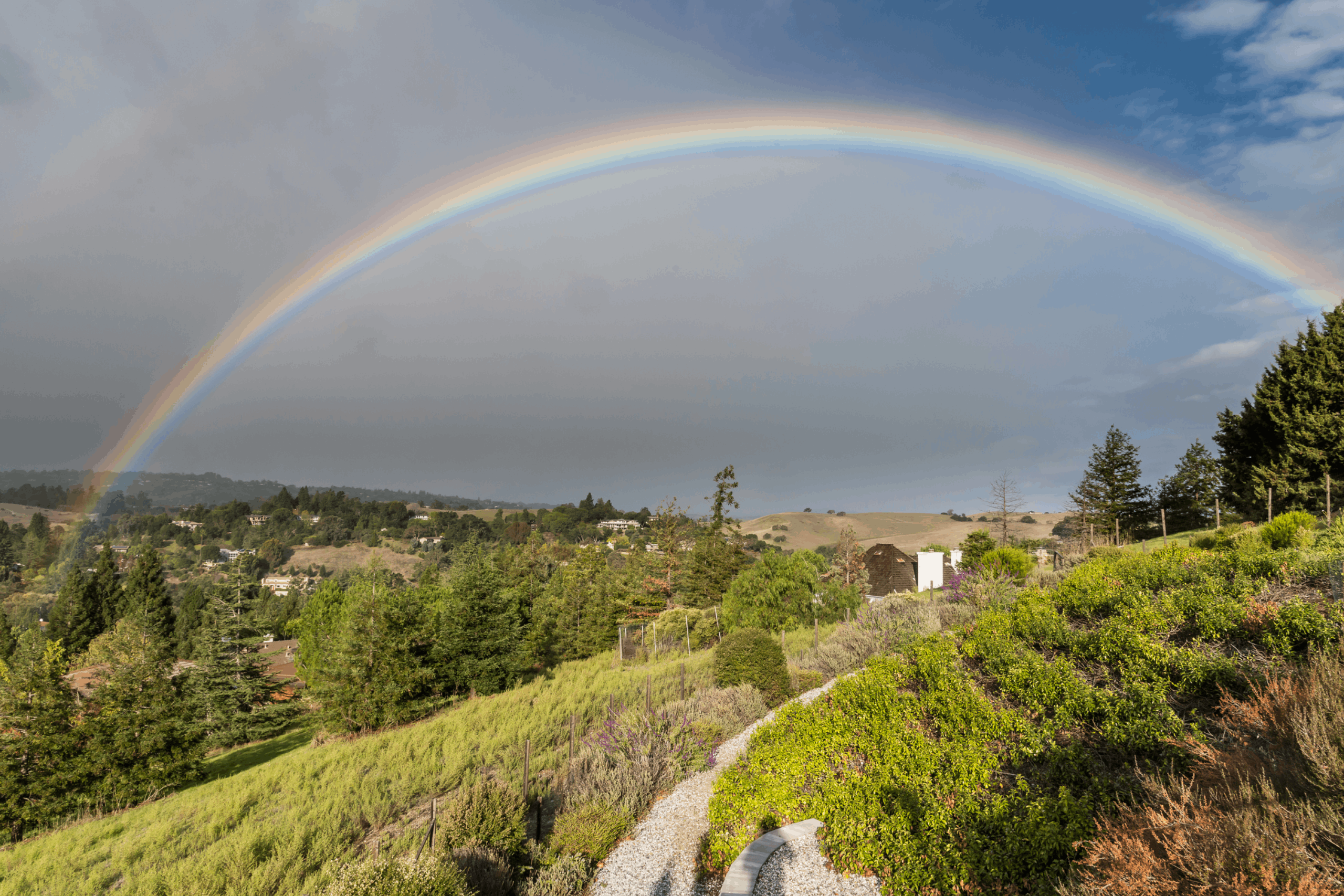 A rainbow is seen over the community of Los Altos Hills in Silicon Valley, California.