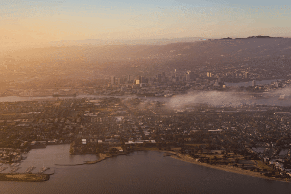 An aerial view of East Bay area, Alameda and Oakland at sunset.