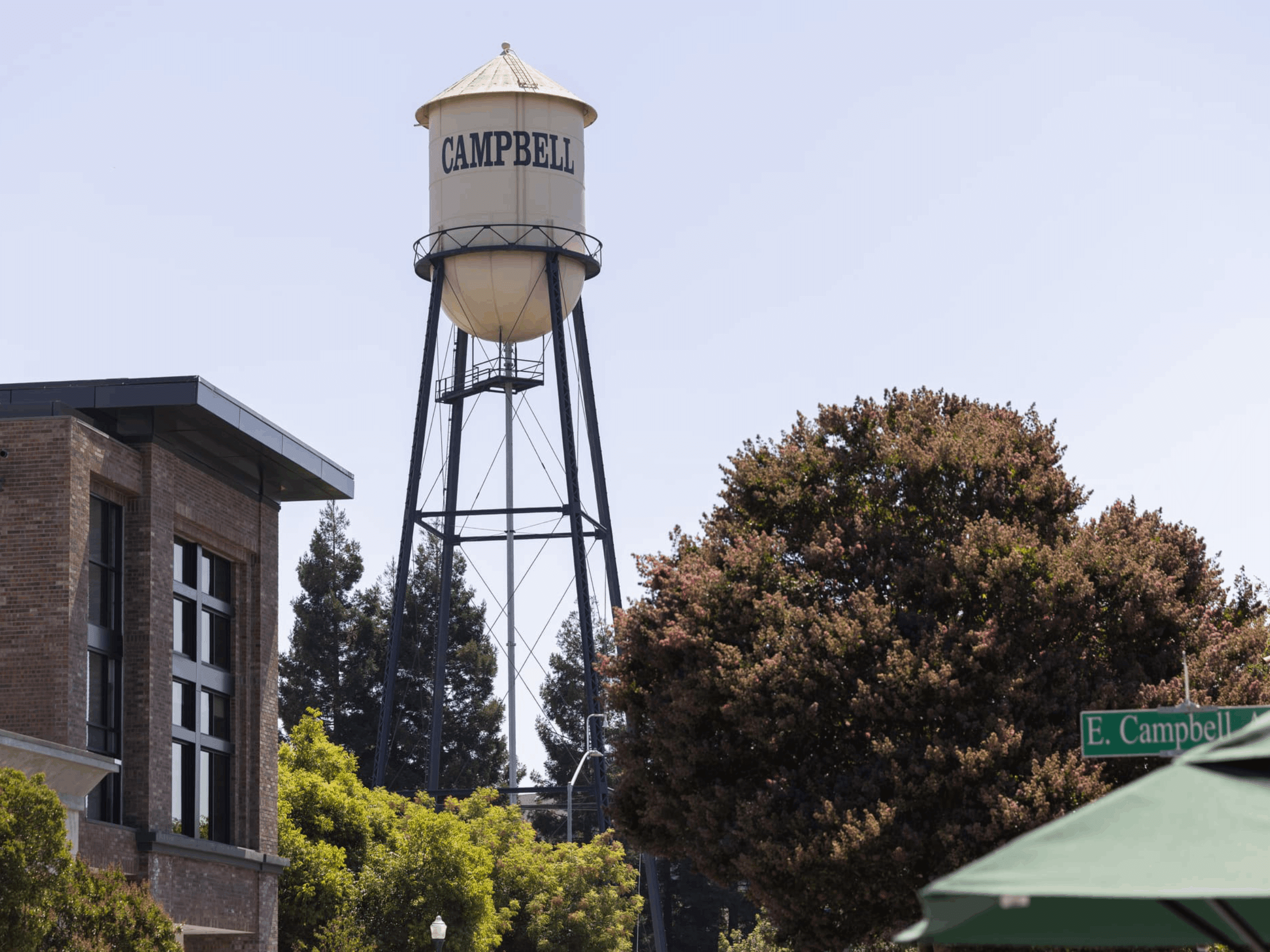 Afternoon sun shines on historic 1928 steel water tower of downtown Campbell, CA.